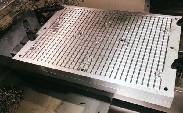 32 Machine offers metal CNC milling and turning services for custom vaccum chucks